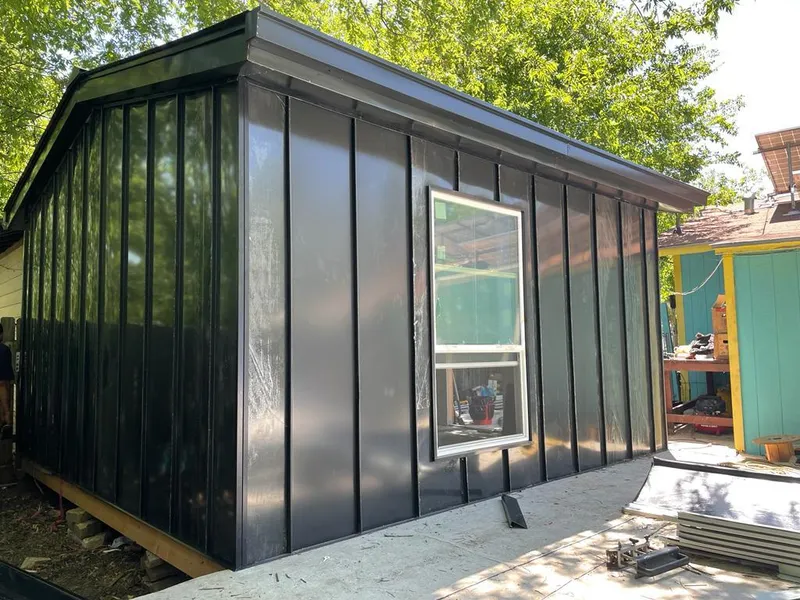 Black standing seam metal wall panels for Roof Inspection in Huntersville