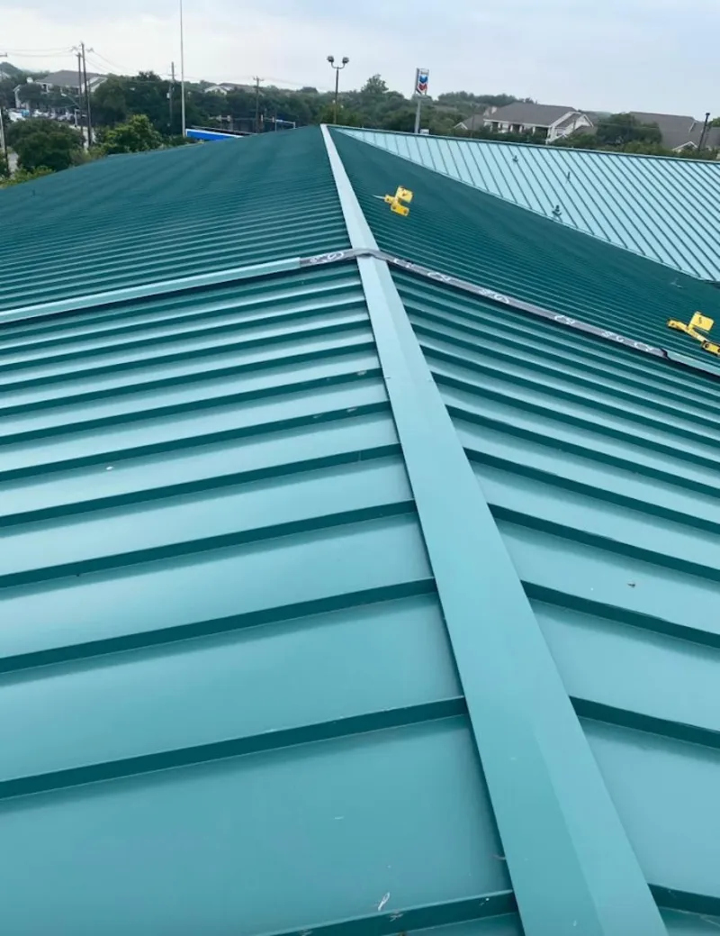 Green commercial metal roof ridge and valley for Metal Roof Repair in Huntersville